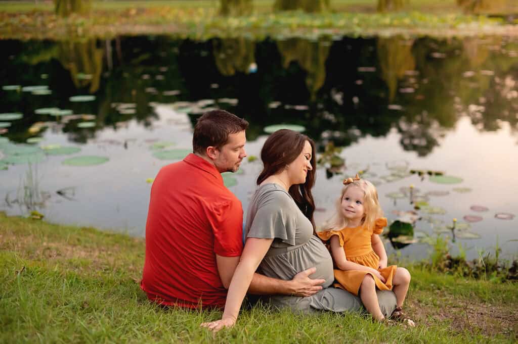 golden hour family session with pregnant mom