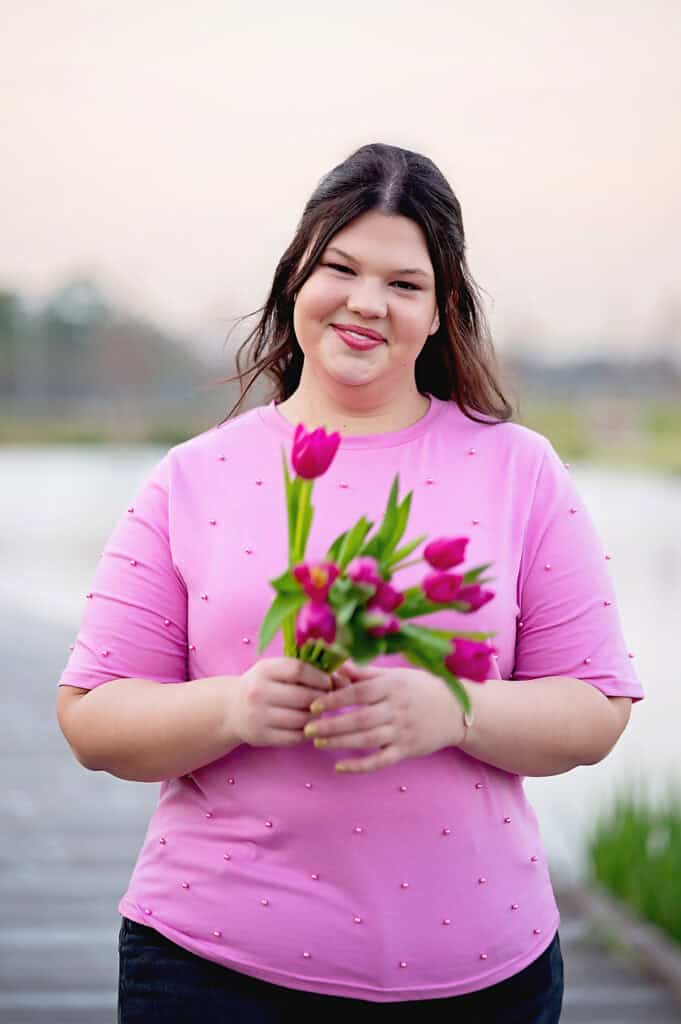 pink top and pink tulips senior photography