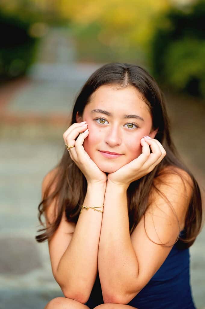 close up senior girl with green eyes